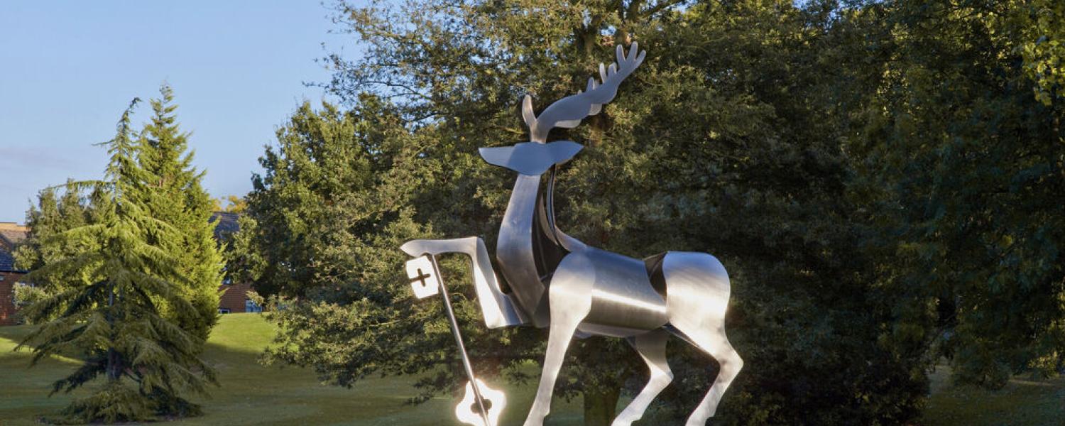 The Surrey Stag sculpture at the entrance to Stag Hill campus