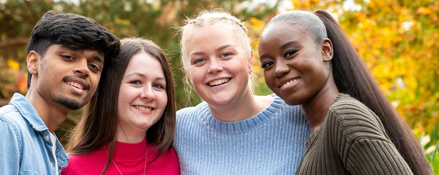 Students smiling on campus
