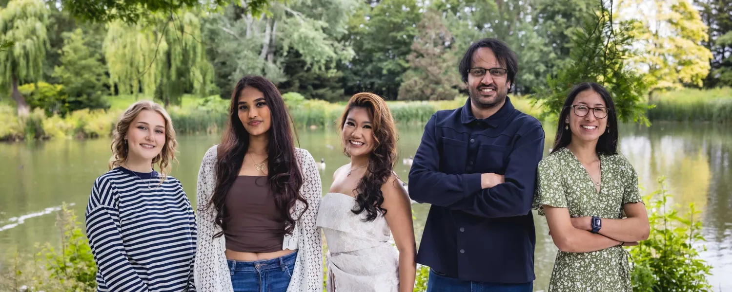 The new Sabbatical Officers standing by the lake on Stag Hill