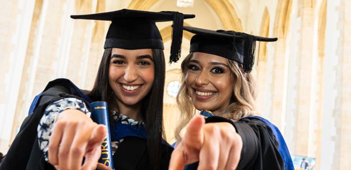 Graduates happy smiling in Cathedral