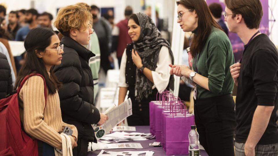 Students and employers at careers event