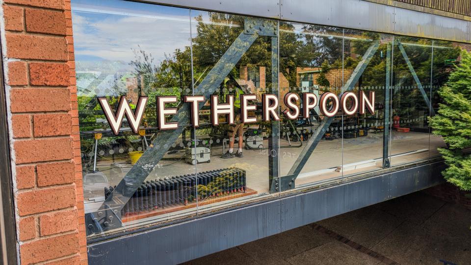The Wetherspoon sign on the side of Wates House